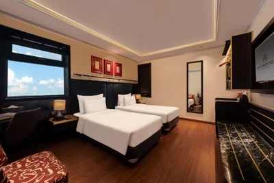 Junior 트윈룸 - 창문 - 도시 전망 — Champton Hanoi Hotel